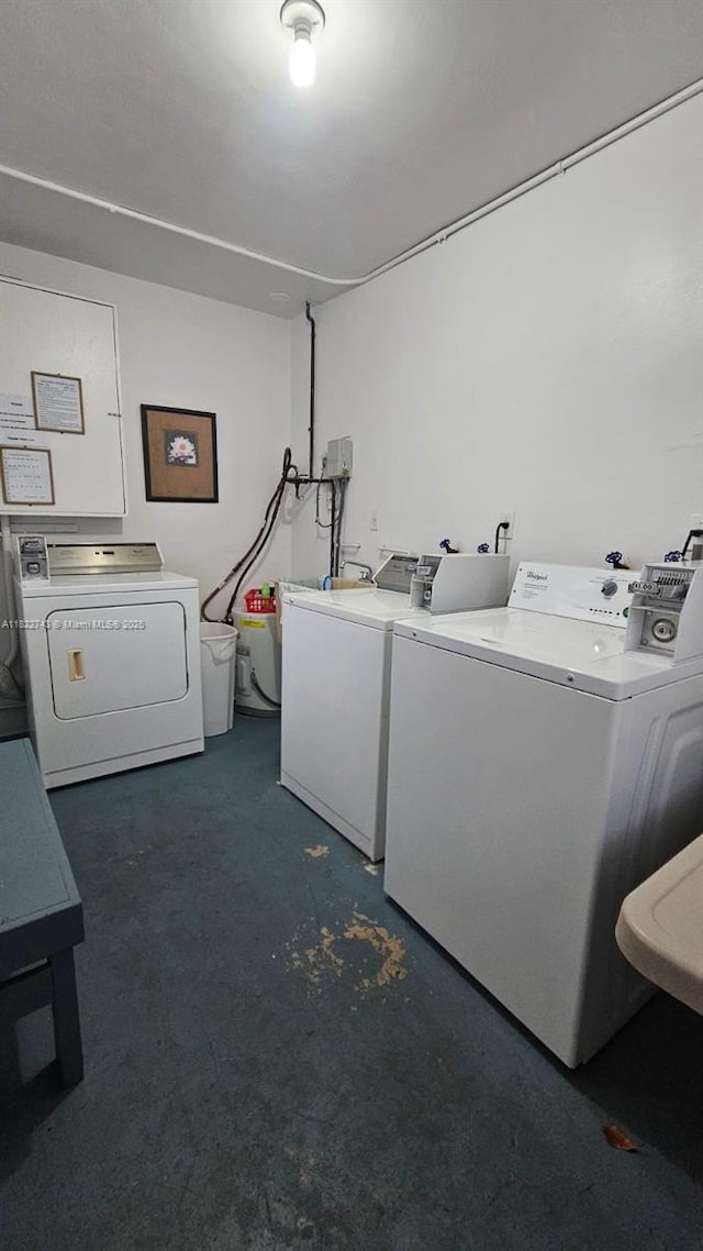 3801 NE 22nd Ter Unit 7, Lighthouse Point, FL 33064 - shared laundry room featuring washer and clothes dryer