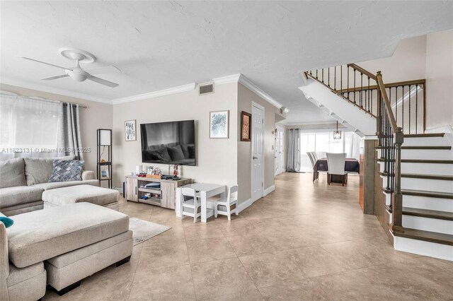 6797 SW 40th St Unit 71, Davie, FL 33314 - living room with stairway, a ceiling fan, and crown molding