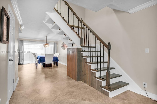 6797 SW 40th St Unit 71, Davie, FL 33314 - stairway with crown molding and tile patterned flooring