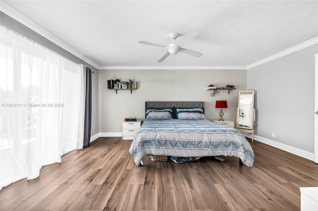 6797 SW 40th St Unit 71, Davie, FL 33314 - bedroom with crown molding, wood finished floors, and ceiling fan