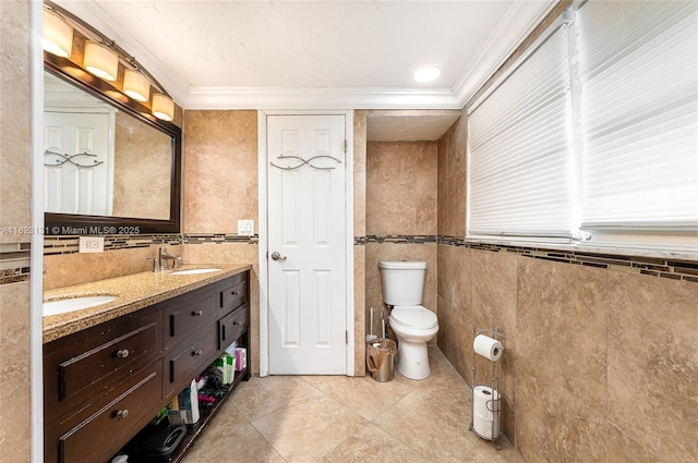6797 SW 40th St Unit 71, Davie, FL 33314 - bathroom with tile walls, double vanity, tile patterned flooring, and crown molding
