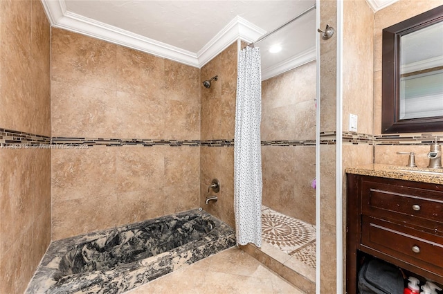 6797 SW 40th St Unit 71, Davie, FL 33314 - bathroom featuring ornamental molding, a tile shower, vanity, tile patterned flooring, and tile walls