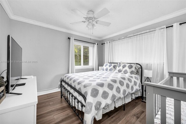 6797 SW 40th St Unit 71, Davie, FL 33314 - bedroom with dark wood finished floors, ornamental molding, and ceiling fan