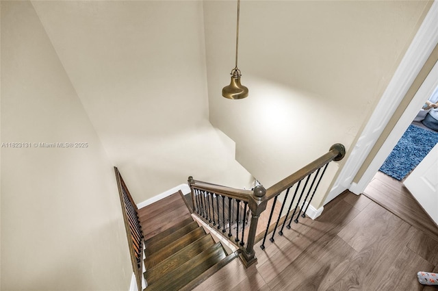 6797 SW 40th St Unit 71, Davie, FL 33314 - stairway featuring wood finished floors and baseboards