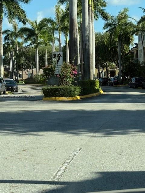 8960 W Flagler St Unit 1, Miami, FL 33174 - view of asphalt road with curbs