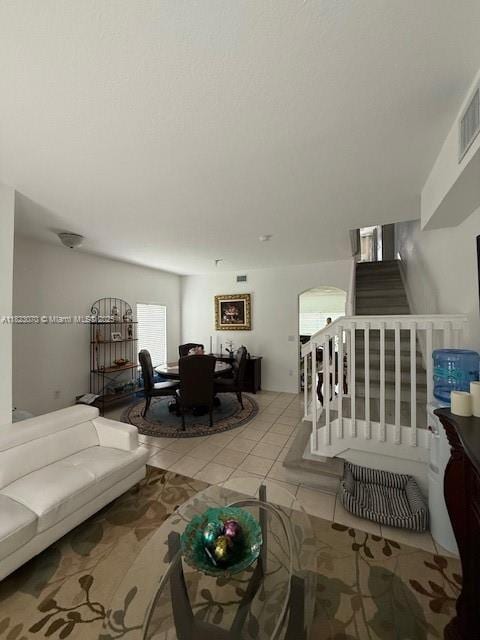8960 W Flagler St Unit 1, Miami, FL 33174 - living area with stairs and tile patterned flooring