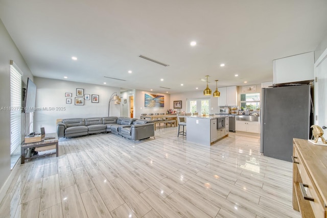 9104 SW 180th St, Palmetto Bay, FL 33157 - living area featuring recessed lighting and wood tiled floors