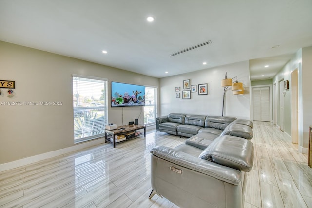 9104 SW 180th St, Palmetto Bay, FL 33157 - living room with light wood finished floors and recessed lighting