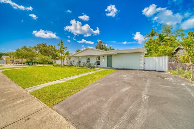 9104 SW 180th St, Palmetto Bay, FL 33157 - ranch-style home featuring a gate and stucco siding