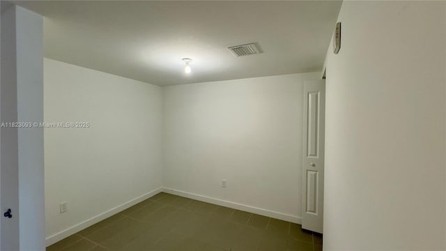 1600 NE 1st Ave Unit 1611, Miami, FL 33132 - unfurnished room featuring baseboards and dark tile patterned floors