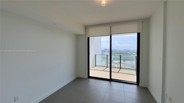 1600 NE 1st Ave Unit 1611, Miami, FL 33132 - unfurnished room featuring floor to ceiling windows and tile patterned floors