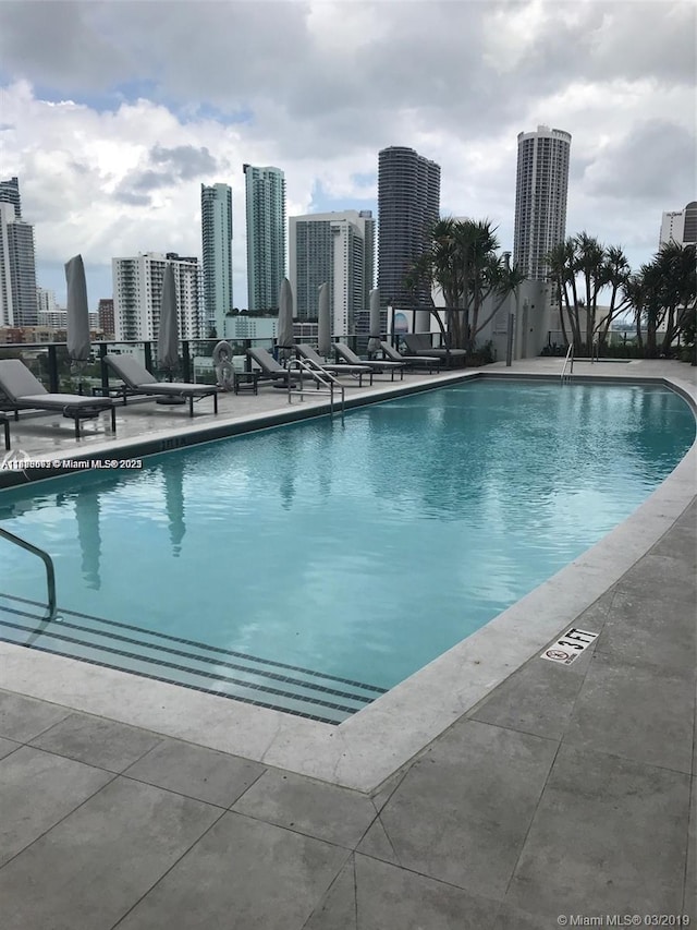 1600 NE 1st Ave Unit 1611, Miami, FL 33132 - community pool with a view of skyline and a patio