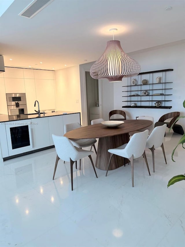 300 Biscayne Blvd Way Unit 5009, Miami, FL 33131 - dining space with light marble finish floors