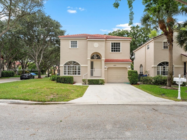 457 NW 87th Ln, Coral Springs, FL 33071 - mediterranean / spanish-style house featuring a tiled roof, stucco siding, driveway, and a front lawn