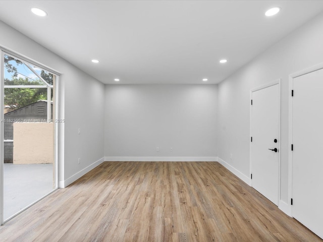 457 NW 87th Ln, Coral Springs, FL 33071 - spare room with recessed lighting and light wood-style flooring