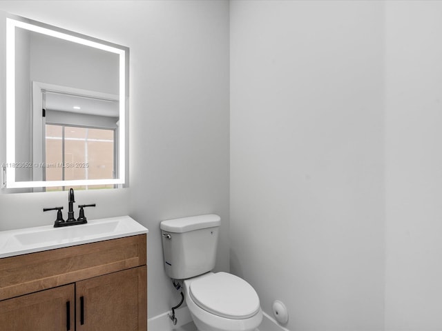 457 NW 87th Ln, Coral Springs, FL 33071 - bathroom with baseboards and vanity
