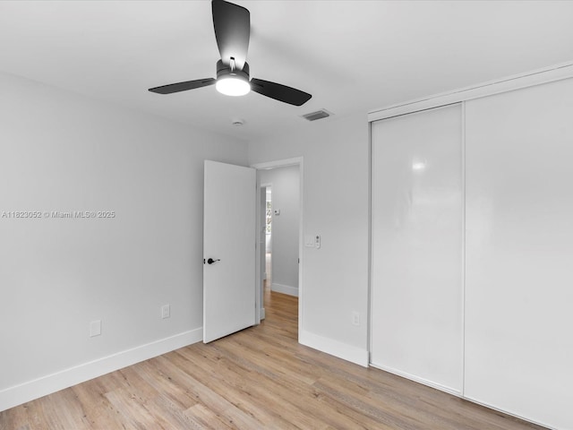 457 NW 87th Ln, Coral Springs, FL 33071 - unfurnished bedroom featuring light wood-type flooring, a closet, and ceiling fan