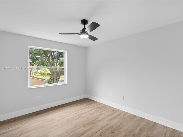 457 NW 87th Ln, Coral Springs, FL 33071 - unfurnished room with light wood finished floors and ceiling fan