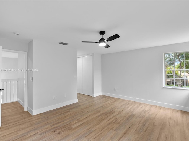 457 NW 87th Ln, Coral Springs, FL 33071 - unfurnished room with light wood-style floors and a ceiling fan