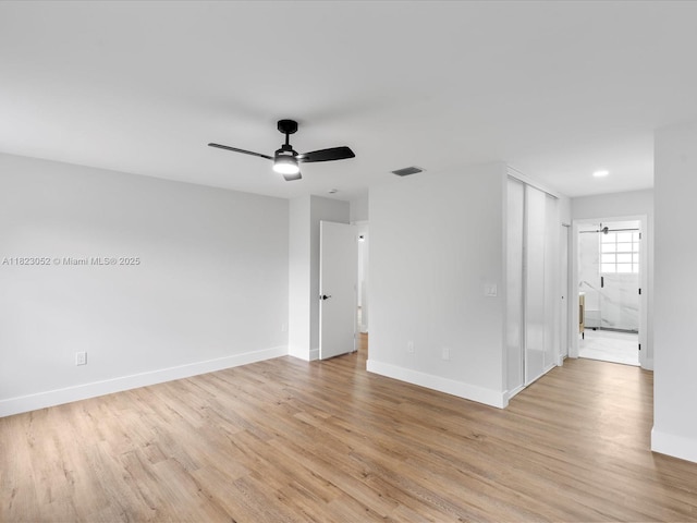 457 NW 87th Ln, Coral Springs, FL 33071 - empty room with light wood-style floors and ceiling fan
