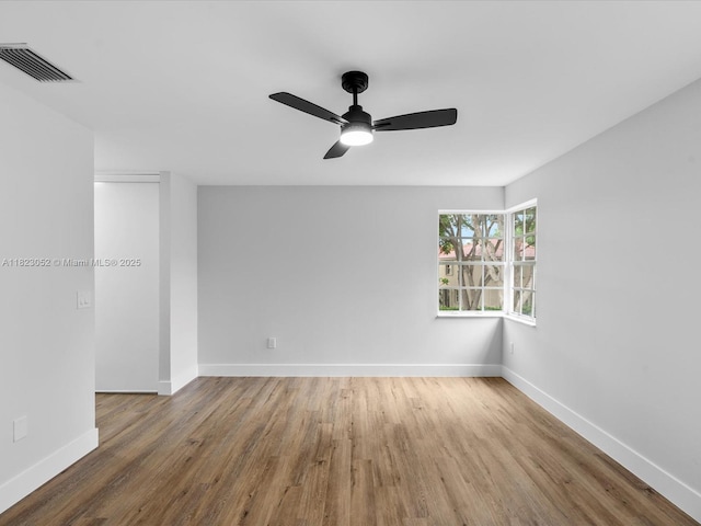 457 NW 87th Ln, Coral Springs, FL 33071 - spare room with wood finished floors and ceiling fan