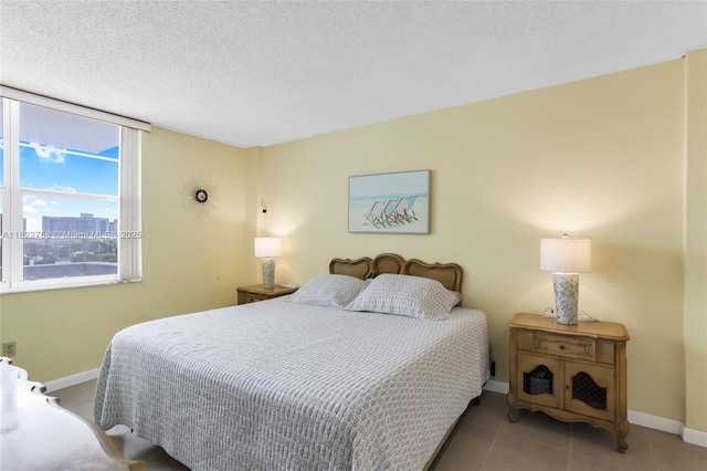 1020 Meridian Ave Unit 616, Miami Beach, FL 33139 - bedroom with baseboards and a textured ceiling