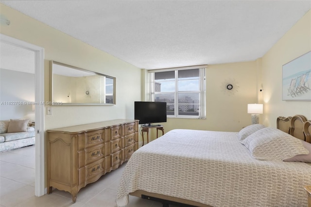 1020 Meridian Ave Unit 616, Miami Beach, FL 33139 - bedroom with light tile patterned flooring