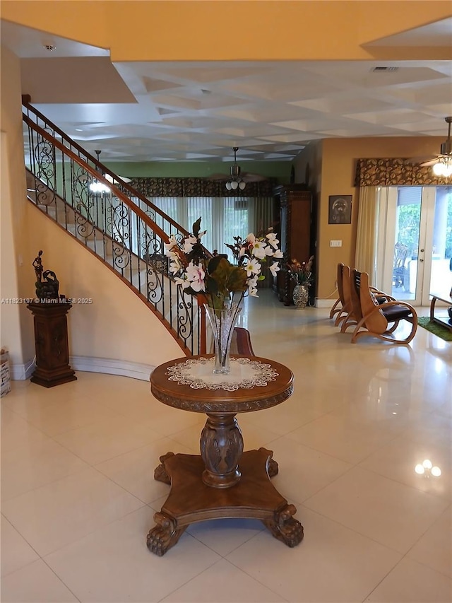 13190 NW 6th St, Miami, FL 33182 - hall featuring a chandelier, stairway, and tile patterned floors