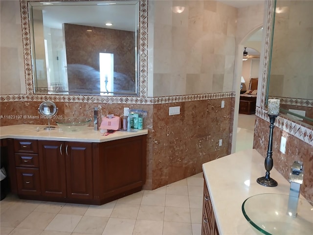 13190 NW 6th St, Miami, FL 33182 - full bathroom with tile walls, vanity, tile patterned flooring, and ceiling fan