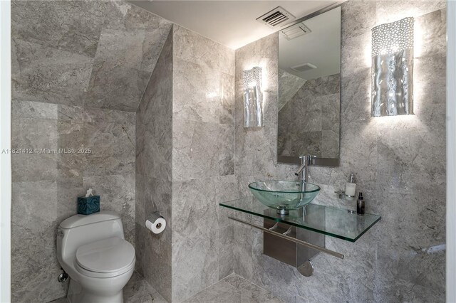 1654 SW 109th Ter, Davie, FL 33324 - half bathroom featuring a sink and tile walls