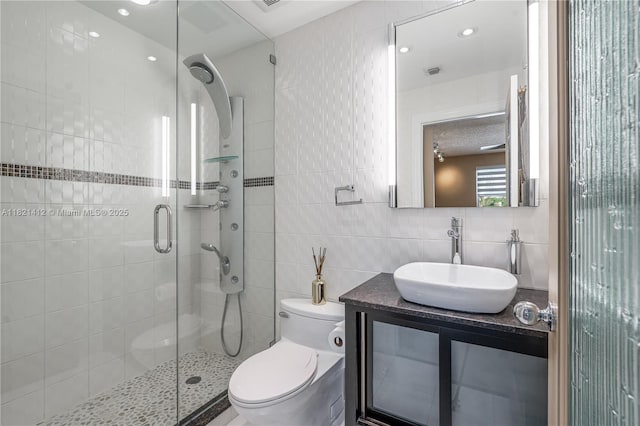 1654 SW 109th Ter, Davie, FL 33324 - full bathroom with a stall shower, tile walls, vanity, and decorative backsplash
