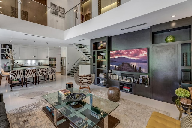 2000 S Bayshore Dr Unit 47, Miami, FL 33133 - living area featuring a high ceiling, stairway, and recessed lighting