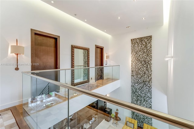 2000 S Bayshore Dr Unit 47, Miami, FL 33133 - hall featuring an upstairs landing and recessed lighting