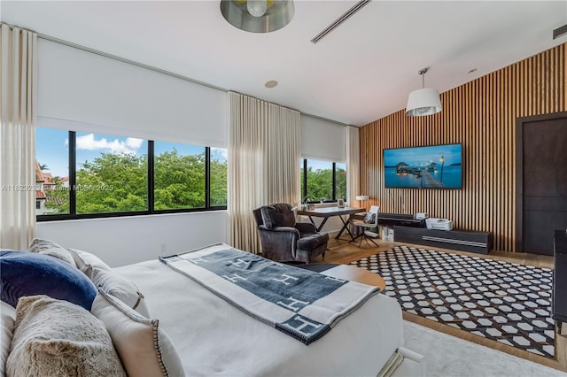 2000 S Bayshore Dr Unit 47, Miami, FL 33133 - bedroom with lofted ceiling and wood finished floors