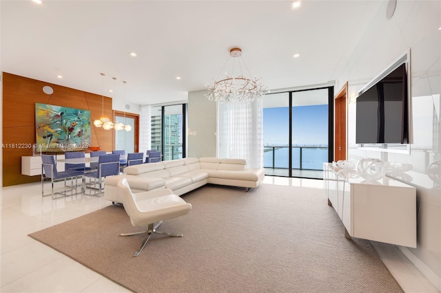 480 NE 31st St Unit 3802, Miami, FL 33137 - living area featuring a chandelier, floor to ceiling windows, and recessed lighting