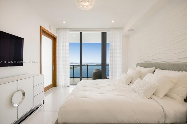 480 NE 31st St Unit 3802, Miami, FL 33137 - bedroom with access to outside, expansive windows, light tile patterned flooring, and recessed lighting