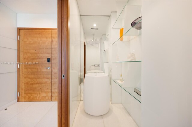 480 NE 31st St Unit 3802, Miami, FL 33137 - bathroom with tile patterned floors, a shower, and vanity
