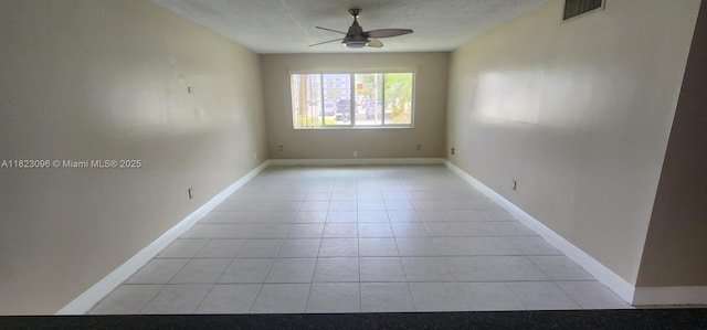 14830 Naranja Lakes Blvd Unit A1B, Homestead, FL 33032 - spare room with a ceiling fan, light tile patterned floors, and a textured ceiling