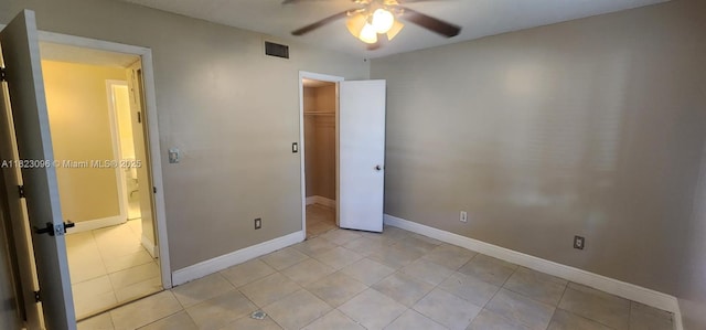 14830 Naranja Lakes Blvd Unit A1B, Homestead, FL 33032 - unfurnished bedroom with light tile patterned floors, a ceiling fan, and a closet