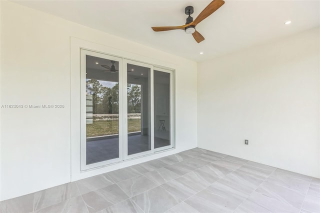 337 Jourferie Rd, Lehigh Acres, FL 33974 - spare room with a ceiling fan and recessed lighting
