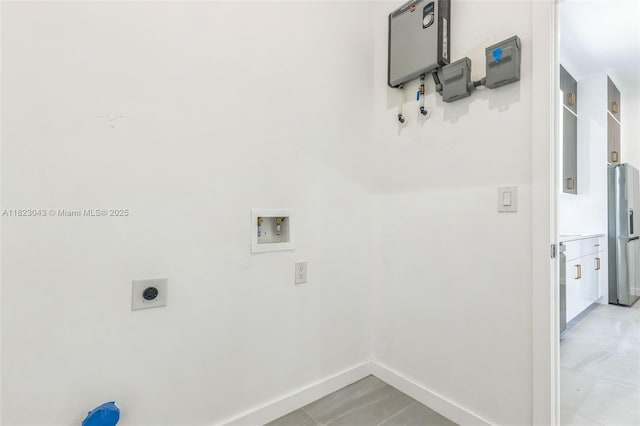 337 Jourferie Rd, Lehigh Acres, FL 33974 - laundry room featuring hookup for a washing machine and hookup for an electric dryer
