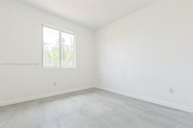 337 Jourferie Rd, Lehigh Acres, FL 33974 - empty room with baseboards