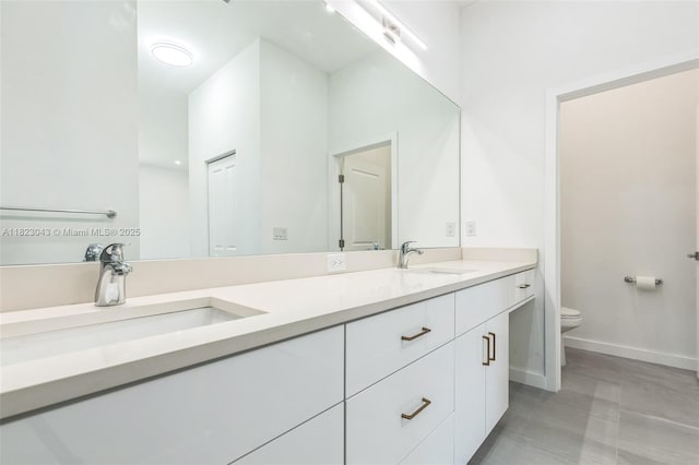 337 Jourferie Rd, Lehigh Acres, FL 33974 - full bath featuring double vanity and toilet