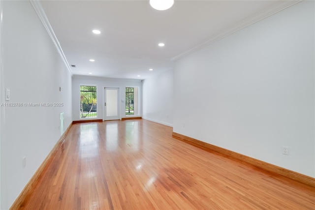 708 Navarre Ave, Coral Gables, FL 33134 - empty room featuring ornamental molding, light wood-style floors, and recessed lighting