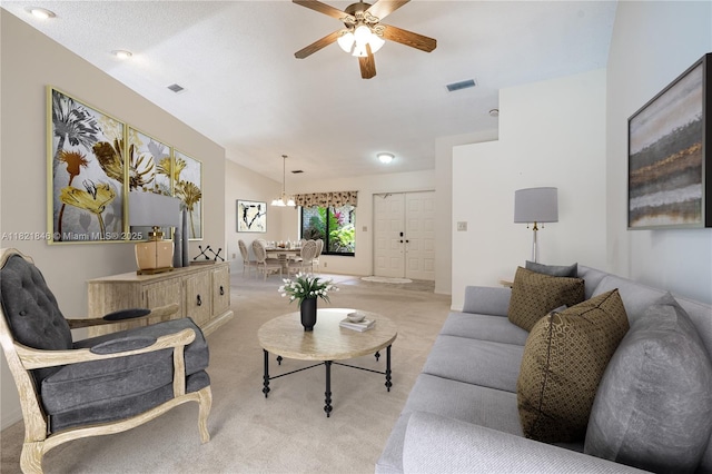 851 Altavista Ter, Davie, FL 33325 - living room with light colored carpet, ceiling fan, and a chandelier
