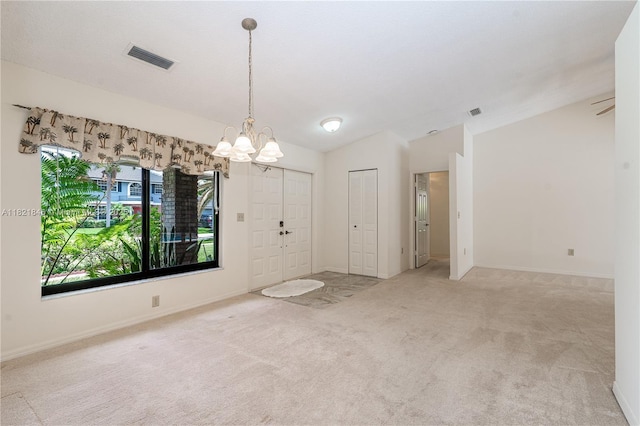 851 Altavista Ter, Davie, FL 33325 - carpeted empty room featuring a chandelier and lofted ceiling
