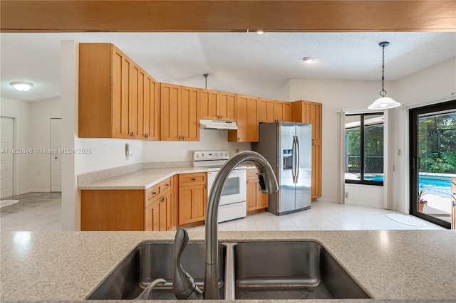 851 Altavista Ter, Davie, FL 33325 - kitchen featuring white range with electric cooktop, under cabinet range hood, stainless steel refrigerator with ice dispenser, light countertops, and vaulted ceiling