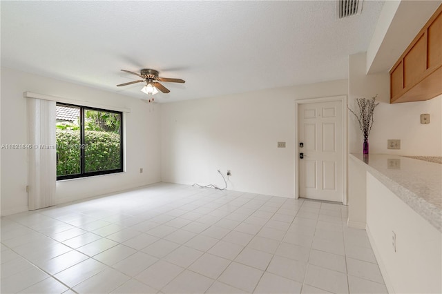 851 Altavista Ter, Davie, FL 33325 - empty room with a ceiling fan and light tile patterned flooring