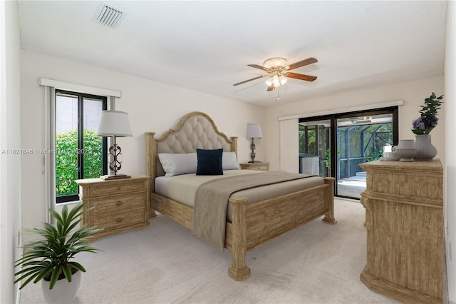 851 Altavista Ter, Davie, FL 33325 - bedroom featuring access to exterior, light colored carpet, multiple windows, and a ceiling fan