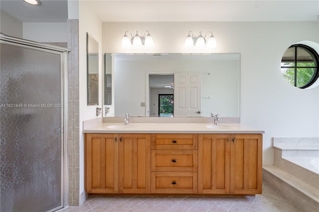 851 Altavista Ter, Davie, FL 33325 - bathroom with a shower stall, double vanity, a garden tub, and tile patterned flooring